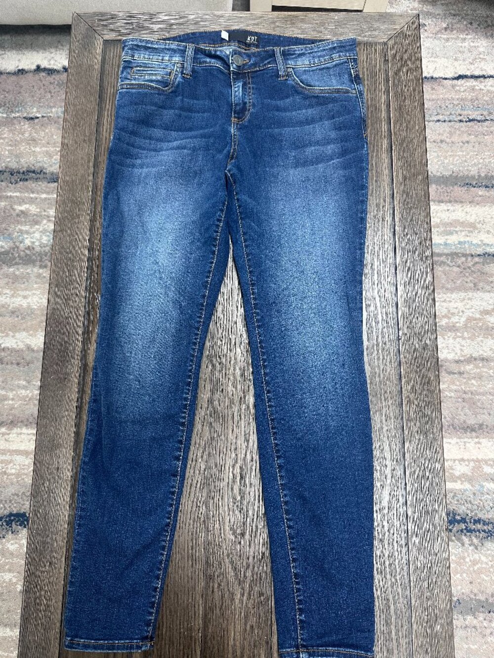 Kut from the Kloth skinny stretch distressed wash jeans size 12.